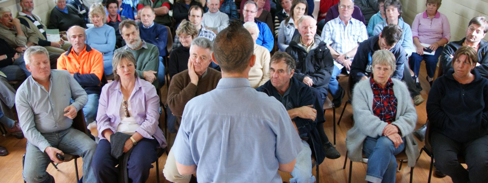 A group of people at a community meeting 