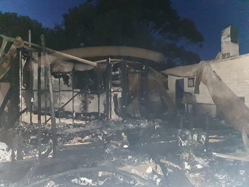 An image of a house in Diggers Rest that was significantly damaged by a fire