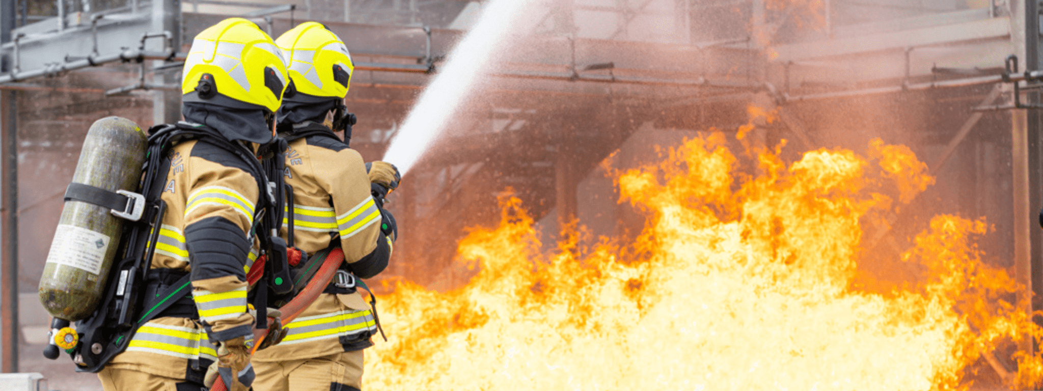 Firefighters attacking flames